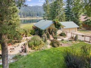 From this view, you can see the cozy fire pit and the pergola area