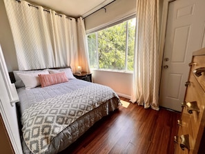 Bedroom 2 - Double (Full Sized) Bed with Blackout honeycomb blinds and curtains.