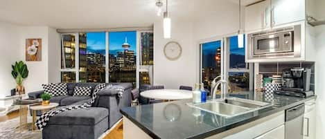 - Open concept living room, kitchen and dinning room
- Stunning view at night