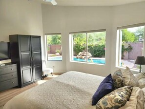 master bedroom with tv