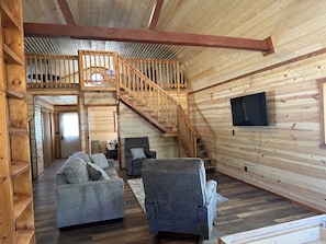 View of the living area and the upstairs loft