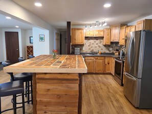 Eat at island with kitchen and partial living room