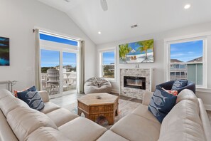Relax in the spacious Living Area with brilliant views and a large Flat Screen TV!