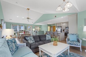 The spacious Living Area with a Queen Sleeper Sofa offers the perfect place for your entire family to relax.