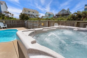 One of the standout features of this exquisite vacation home in the 12' x 29' Private Pool and bubbly Hot Tub!