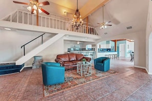 This home has an open floor plan with high celling that make it the best place to spend time together as a large group.