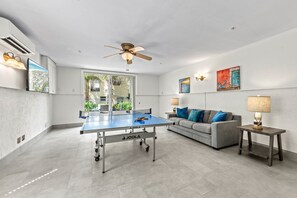 Cabana bliss: TV, Comfy Sofa, and Ping Pong fun! Game anyone?