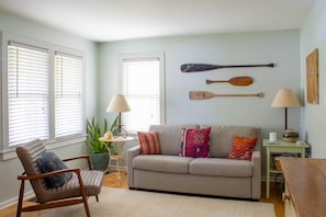 Bright and cozy living room off the entry