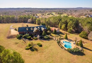 [Exterior] There is No Shortage of Space Here, Relax on the Private 30 Acres of Land and Explore the Pool and Pond on the Land.