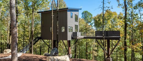 Welcome to The Kite, a 1 bedroom treehouse with a hot tub perch to the side into the trees