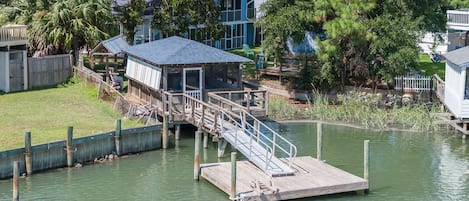 Welcome to your own private dock and dockhouse on the tidal creek.  Just steps from your cottage Blue Haven Tybee.