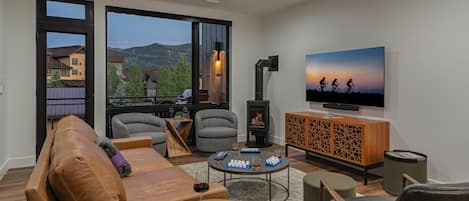 Great room on main level with gas fireplace and views