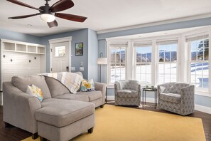 Upstairs living space is perfect for family and friends to gather.