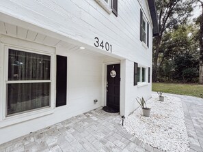 Tucked away Front Door welcoming you into this charming cottage!