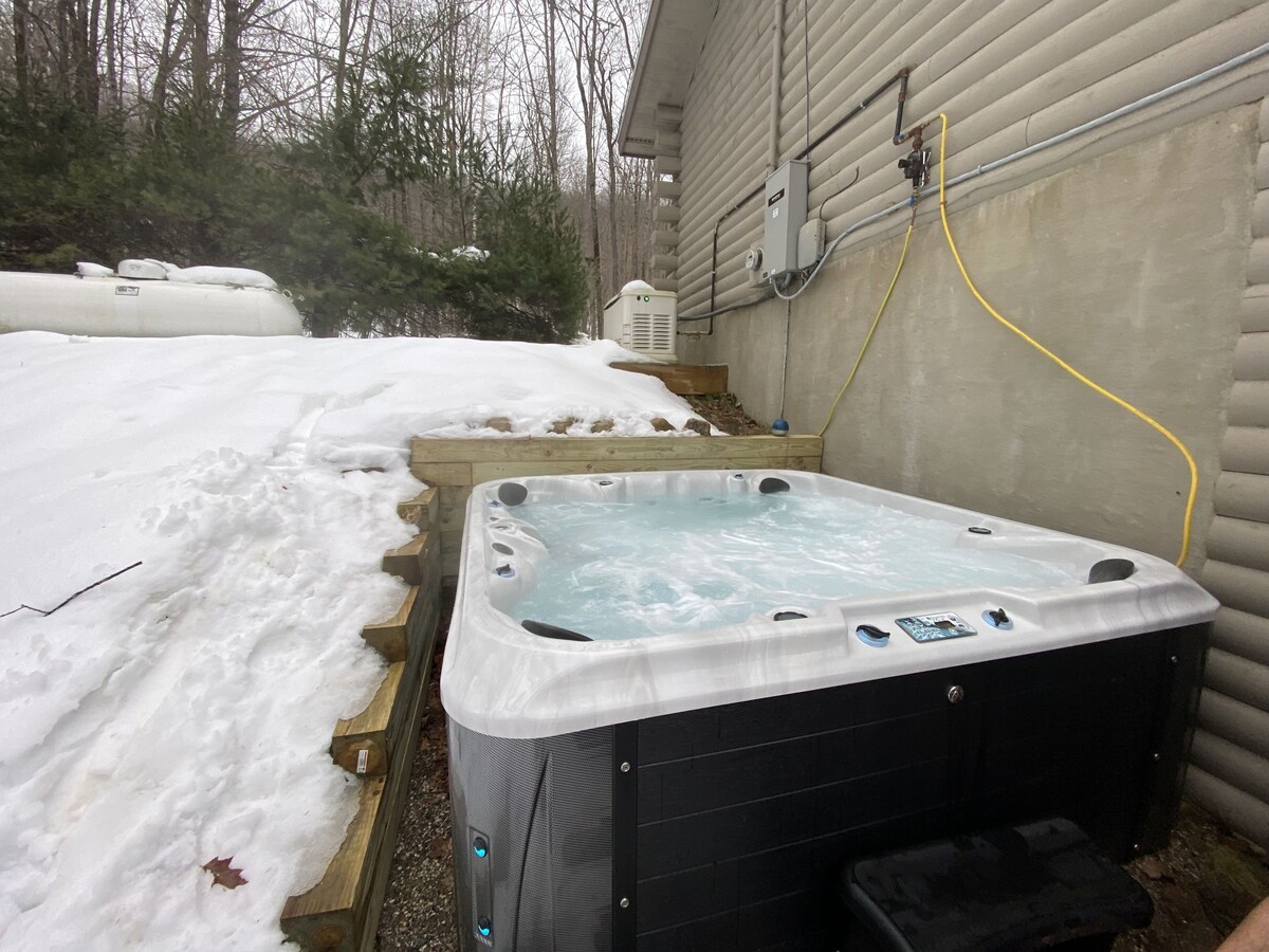 Lakefront cabin with dock, hot tub, fire pit!!