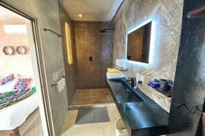 Bathroom with a rain shower.