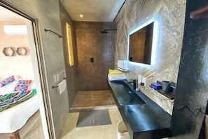 Bathroom with a rain shower.