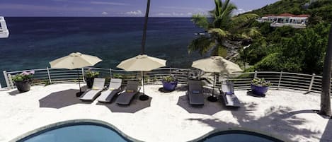 Huge Pool and pool deck, just feet from the ocean!