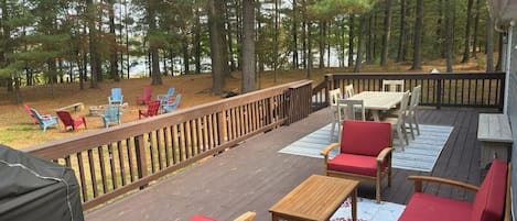 Spacious backyard with deck and firepit. Lots of seating!