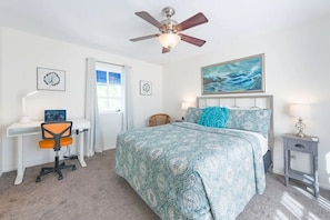 Bedroom 2 features height-adjustable desk, mountain views, private patio entry