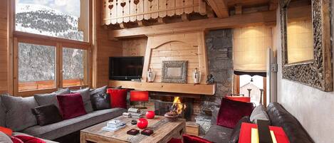 Warm up by the fireplace while soaking in breathtaking alpine panoramas.