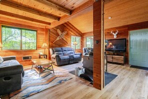 Our great room is a cozy and inviting space where everyone can gather and relax.