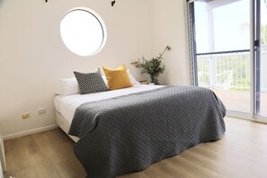 Main bedroom with ensuite and direct access onto b