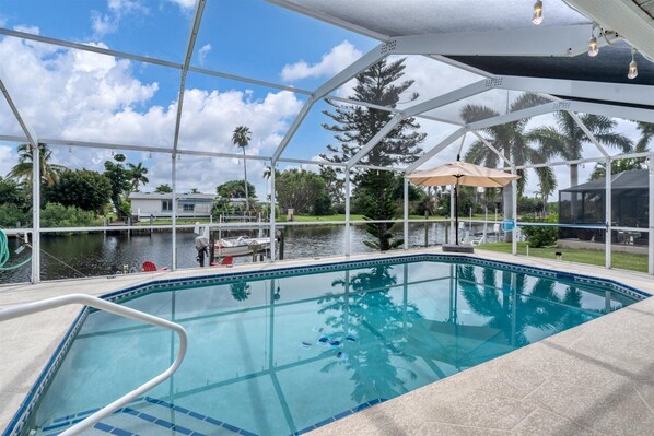 Sparkling pool overlooking the canal waters