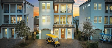 6-seat Golf Cart FREE during your stay! 2 minutes to the beach. Sleeps 15, 6 bedrooms, 5.5 bath, and 10 beds. Game room and bunk rooms. Heated pool across from the house!