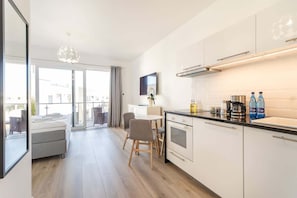 The kitchenette's practical layout maximizes space and functionality.