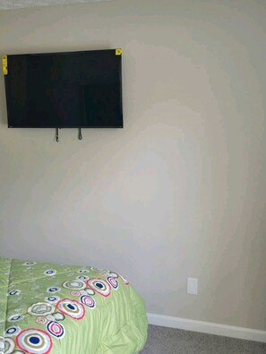 
Bedroom 4 with flat-screen smart TV