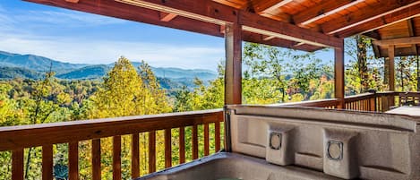 Some Peak Somewhere Cabin's private hot tub with views