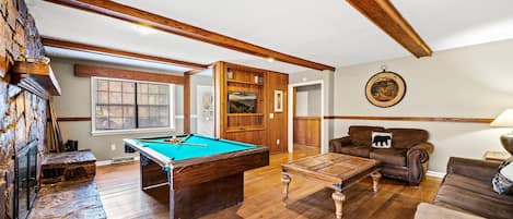 On the River's living area with pool table