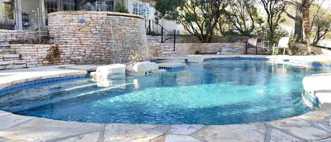 Swimming Pool with waterfall and fountain