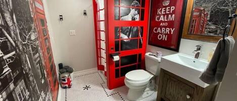 Take a shower in the red phone booth in our London-themed bathroom.