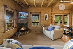 Rock Fireplace and TV in the Main Level Living Area