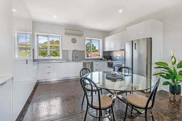 Open plan dining and kitchen area
