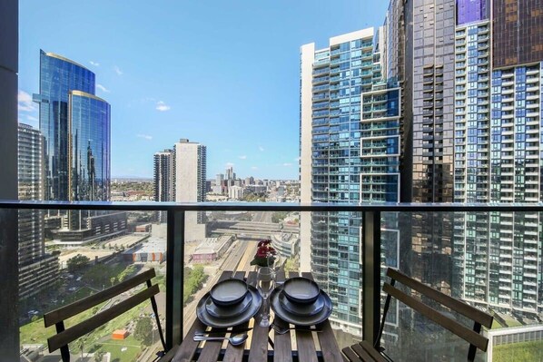 A balcony with city views.