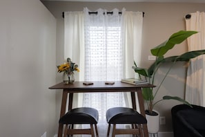 Chic and functional space showcasing a refined table and chairs, adding a touch of sophistication to any home decor scheme