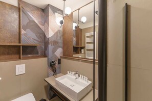 Comfortable bathroom with hairdryer. 