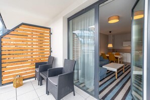 Furnished balcony, where the guests can relax.