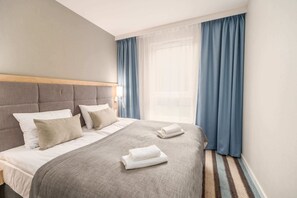 Bedroom with comfortable double bed.