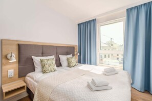 Bedroom with comfortable double bed.