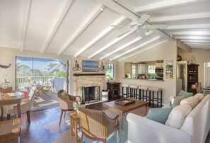 Living Room with Candlelit Fireplace and HDTV