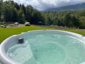 Take in the amazing mountain views from our luxurious hot tub!