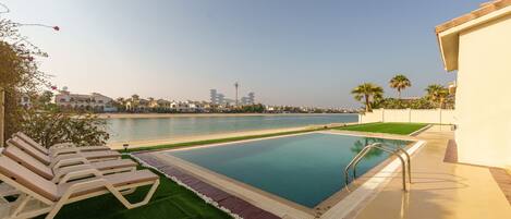 Holiday villa with pool and private beach with Royal Atlantis views in Palm Jumeirah Dubai