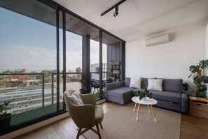 Let the sun stream through or pull the black-blinds in the living room and kick back on the L-shaped lounge with a movie. 