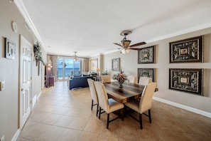 Welcome to Ocean Reef 809 - Large living space with dining table as well as additional bar counter seating and fabulous Gulf Views!