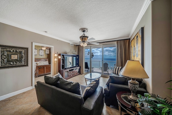 Comfortable NEW seating in the living room overlooking the spacious balcony and views of the Emerald Coast