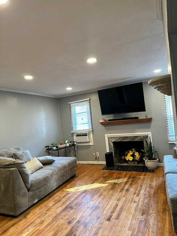 Spacious living room with plenty of natural light.